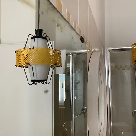 En La Corte Ασίζη