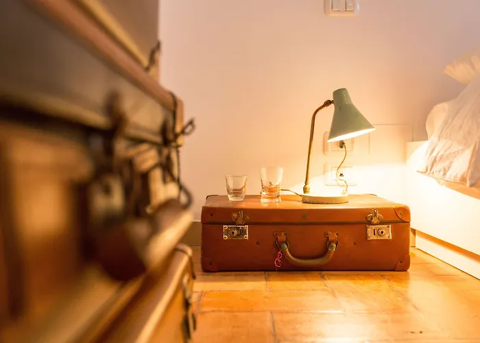 Casa de hóspedes En La Corte Assisi