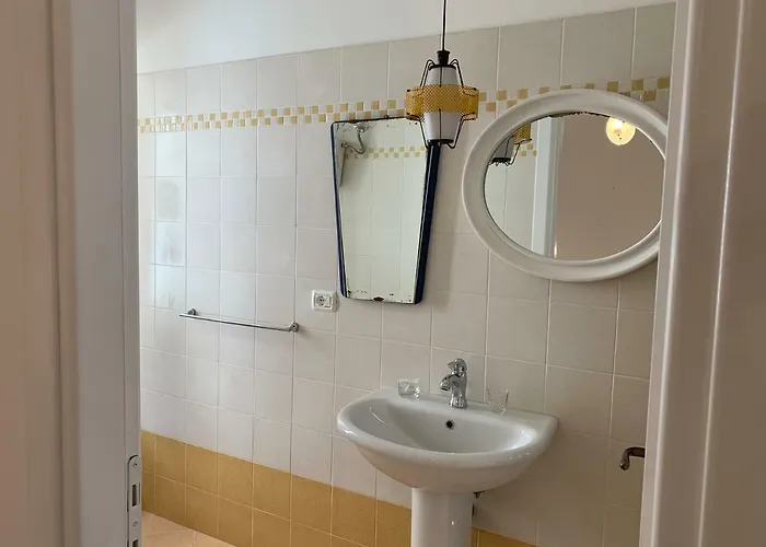 Casa de hóspedes En La Corte Assisi