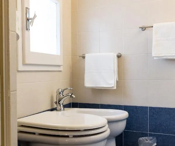 Casa de hóspedes En La Corte Assisi